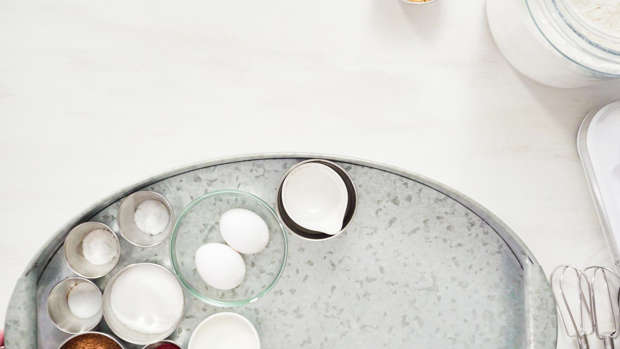 Clean atelier table with utensils and ceramic plates